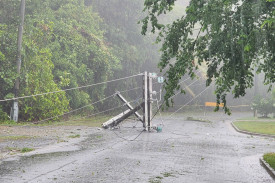 A power pole snapped in half at Port Douglas. Picture: ‘Gazza’ McIlroy