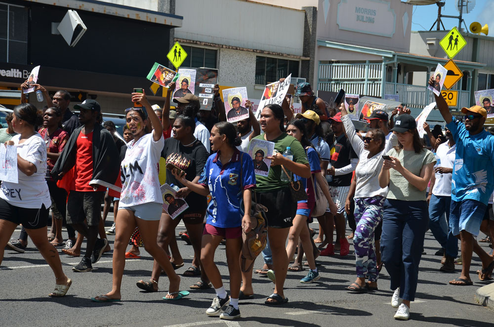 Around 500 people took part in a protest march through the main street of Mareeba on Monday morning