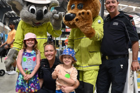 Siblings Emilia and Jackson Coxall with Blaze the Bear, Bushy the Dog and Kaylea Chard and Dwain Guivarra from Fire Rescue.