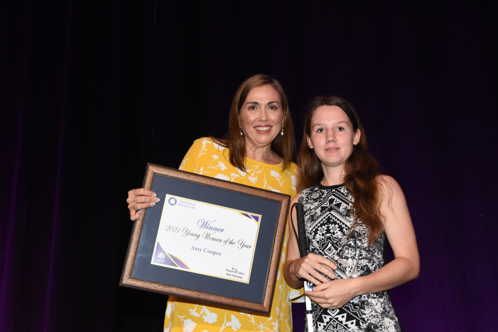 Amy Cooper being presented with Young Woman of the year 2021