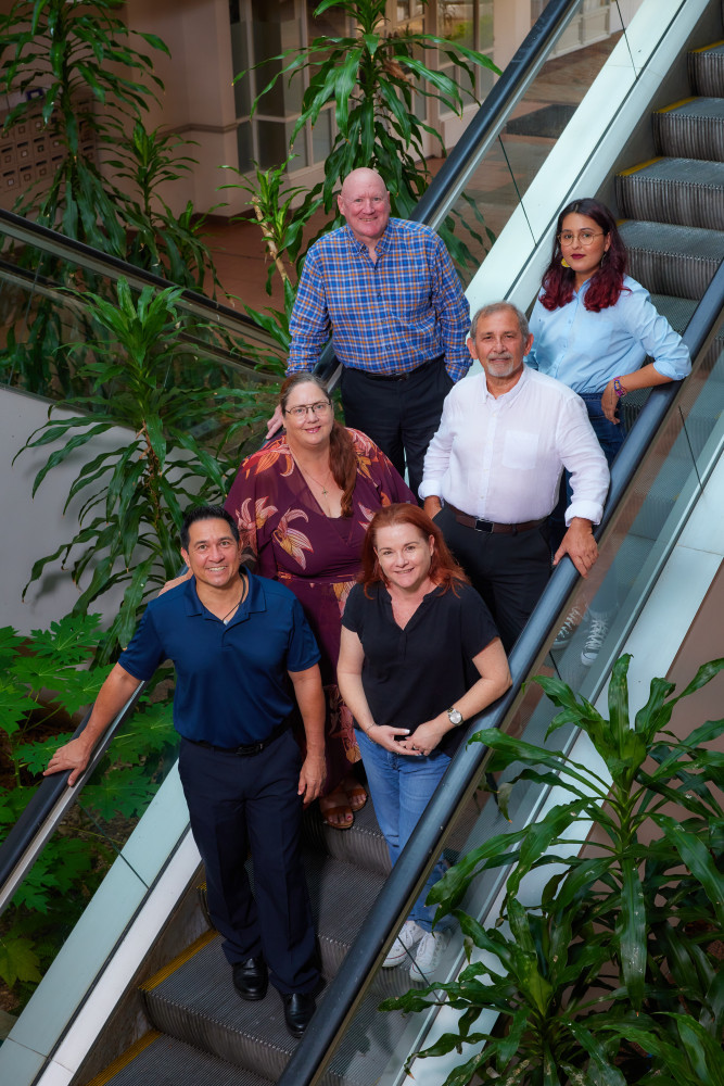 The Cairns Local News team (front to back) Nick Dalton, Isabella Guzman Gonzalez, Kath MacLean, Carl Portella, Almando Anton and Lisa Harris