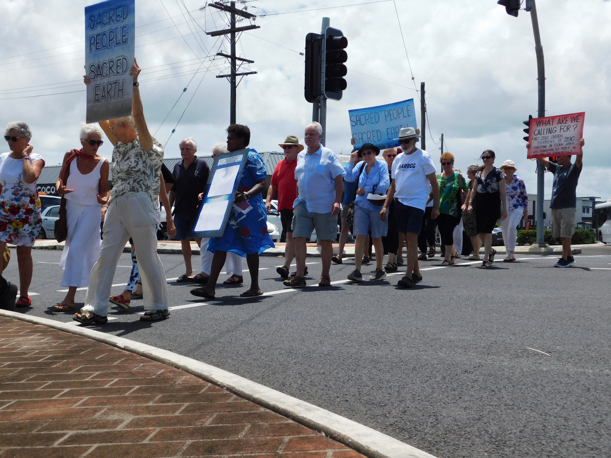 Members of the Cairns religious community marched to Warren Entsch’s office on Thursday.