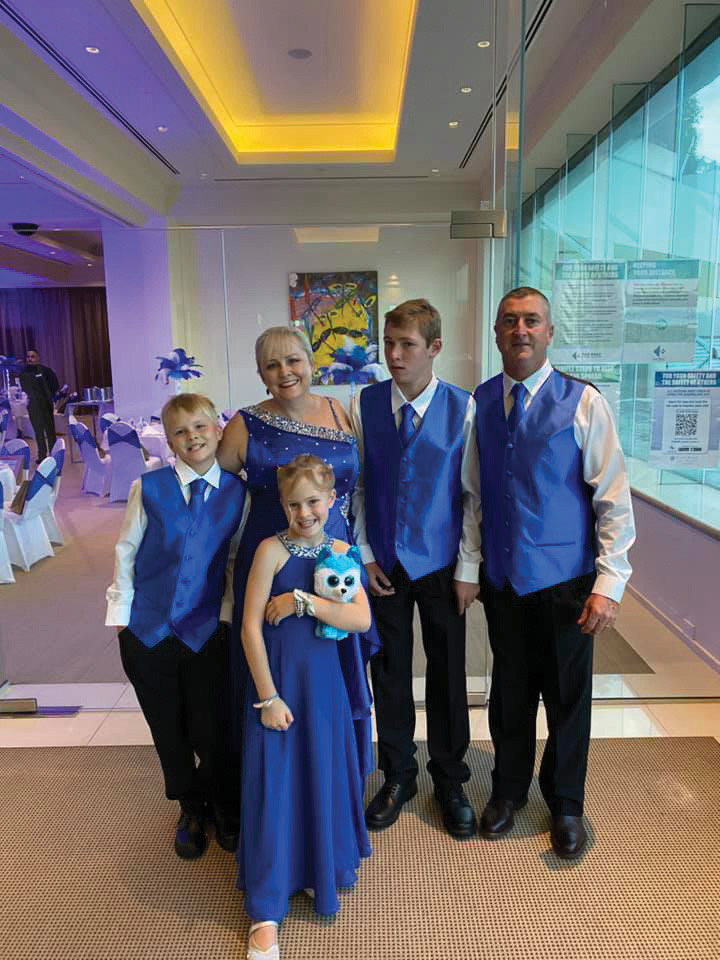 Nicola Baker and her family at the Moyamoya Blue Tie Gala Ball 2021