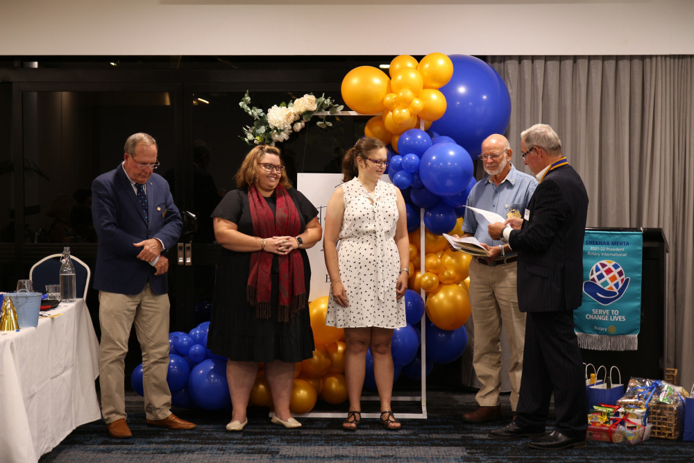 (L-R) Area Governor for Rotary David Kirchner, new members Cassie Stanley and Maddy Hoffman, Jeff Crofts and President of Rotary Cairns Mark Dodge