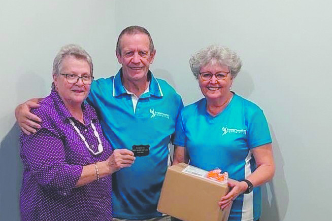 Lions Club of Cairns Barrier Reef President, Rachel Davy with Freshwater Tennis Club President, Brian Davis and Committee member, Delmae Davis