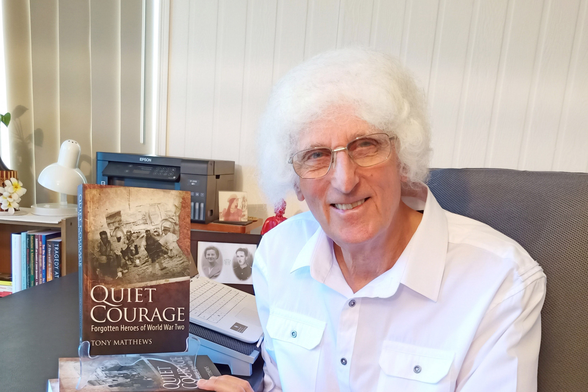 1. Author Tony Matthews with his latest book, Quiet Courage.