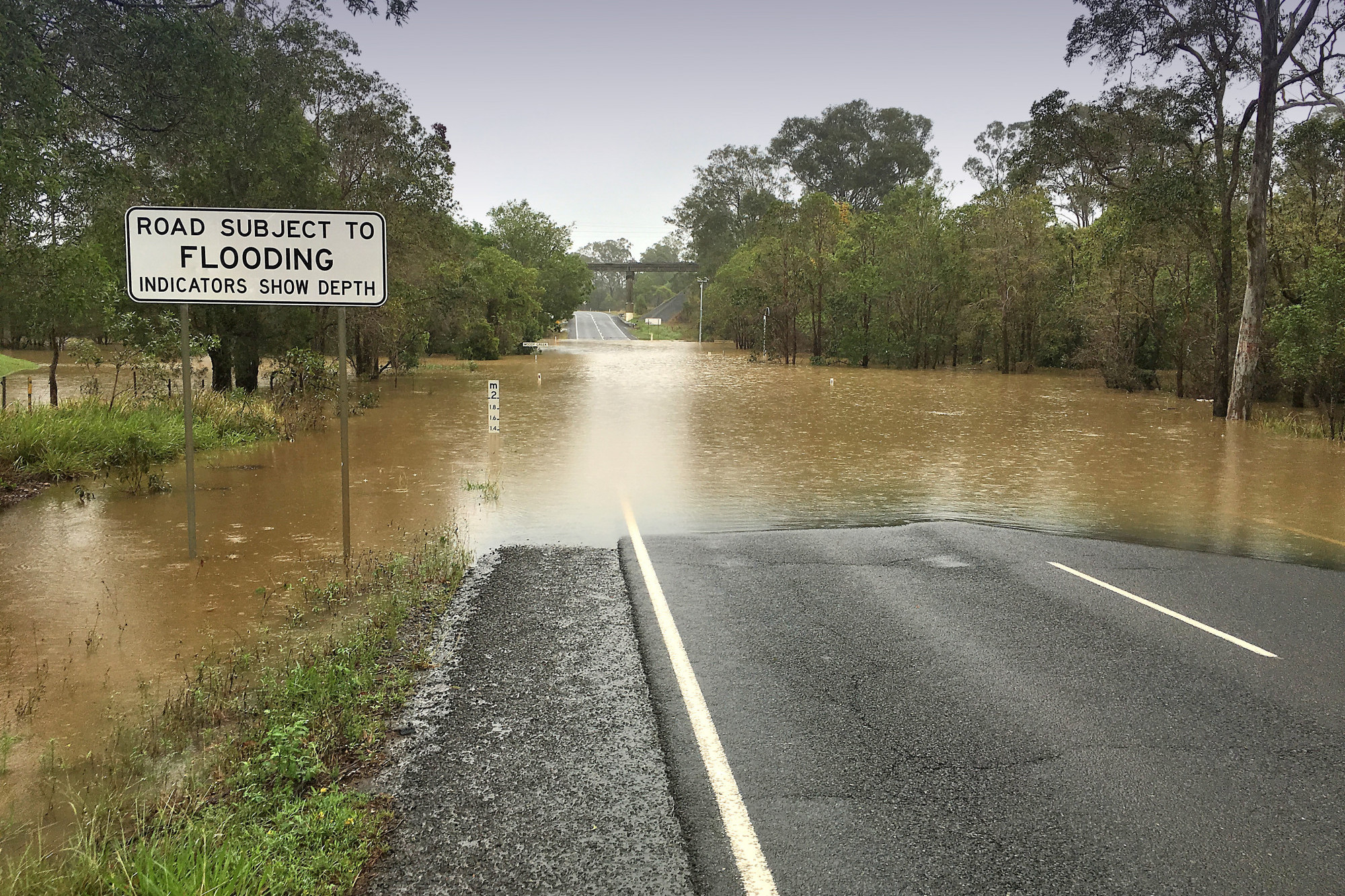 Never drive, ride or walk through flooded waters - feature photo
