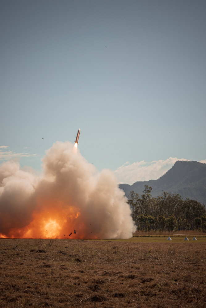 A United States Army M901 Launching Station fires a MIM-104 Patriot surface-to-air missile to engage a target, at the Shoalwater Bay Training Area in Queensland, during Exercise Talisman Sabre 2021.