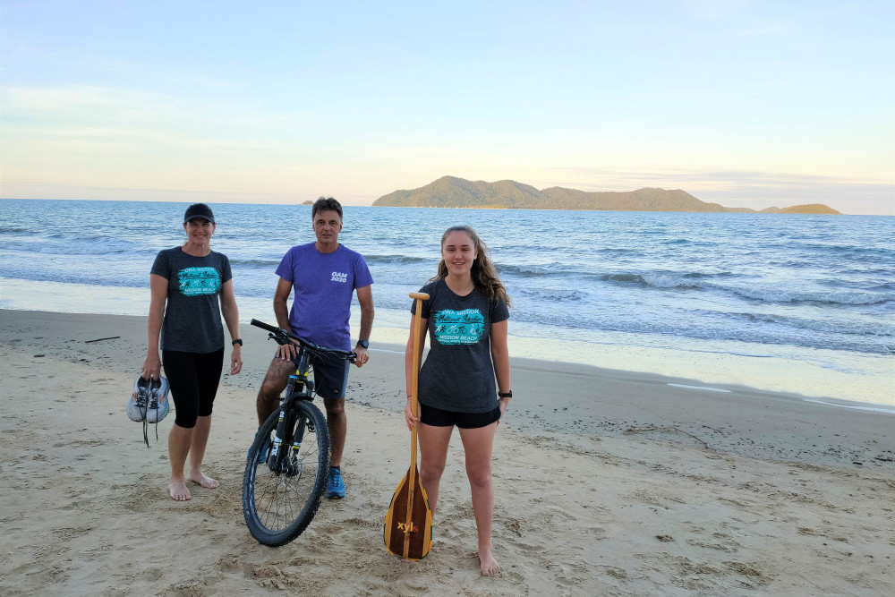 Solo competitor, event director and team paddler: (L-R) Kathy White, Richard Blanchette and Charlotte Sharpe gear up for Mission Beach’s Ona Mission Multisport Adventure Race.