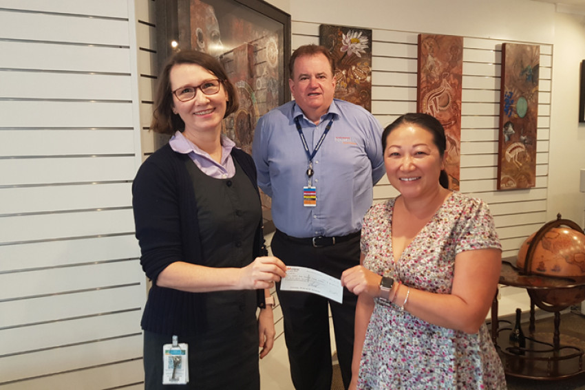 Cardiac Ward Nurse Unit Manager Mandi Pashley receiving the generous donation from Northern Frontier General Manager Linda Ly along with Far North Queensland Hospital Foundation CEO Tony Williamson.