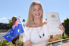 Katherine Mason from Canada celebrates becoming a new Aussie citizen outside CPAC