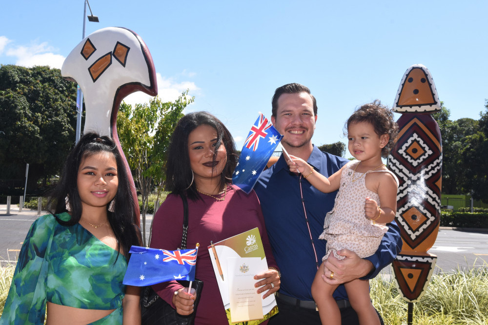 New citizen Suchila Rattanachai (second from left) with daughters Ainthira Donphraya (far left) and Phoebe Mitchell, and partner Travis Mitchell.