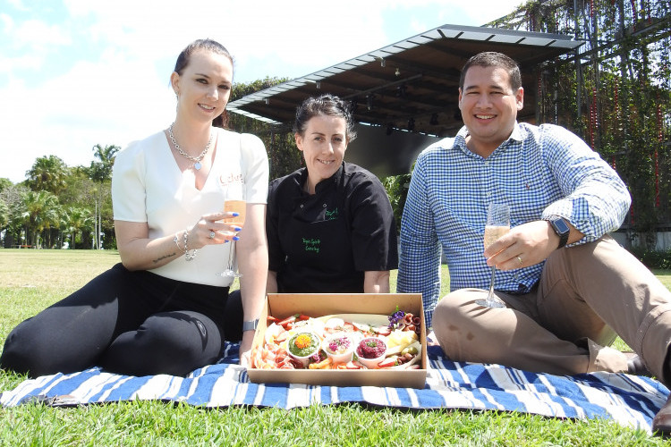 Carley Elsum, General Manager and Director of Ochre Restaurant, Nicole Griggs Director of Tropic Spirit Catering and Nathan Lee Long from the Cairns Food and Wine Festival PHOTO: Peter McCullagh