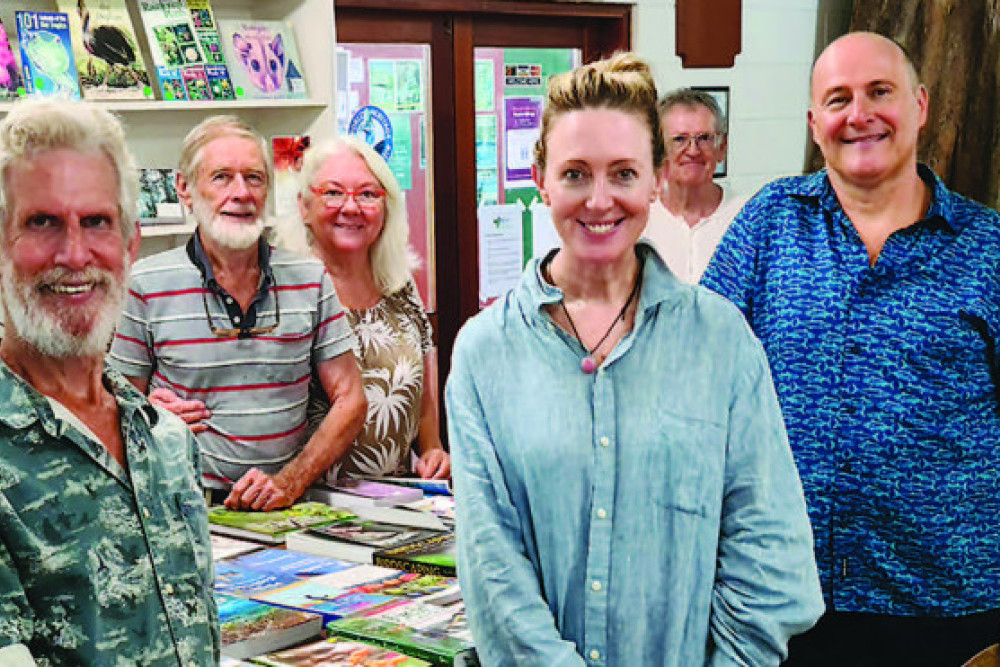 Actors Roz Hammond and Russell Dykstra, front centre, are pictured in the C4 Environment Centre at Mission Beach with members of C4 (Community for Coastal and Cassowary Conservation)