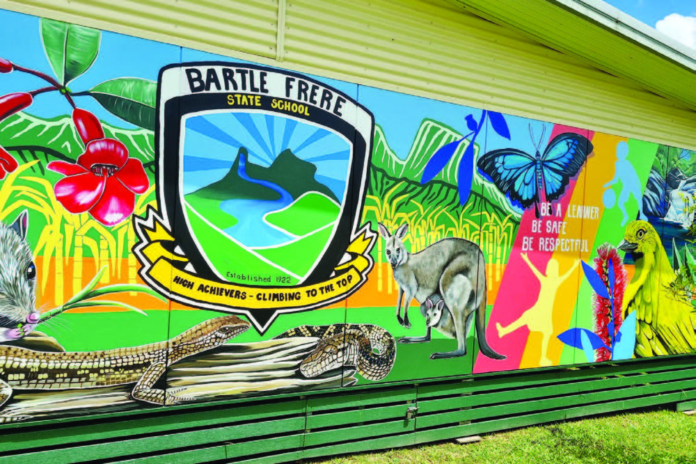 Students and koda the Support Dog all took part in the creation of a magnificent mural at Bartle Frere State School recently.