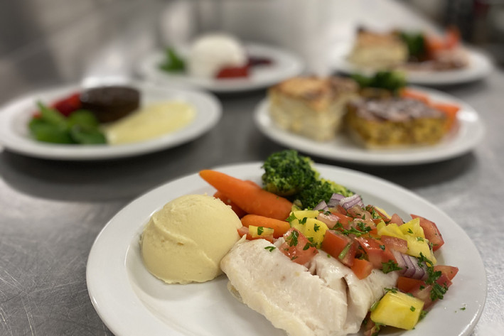 Cobia fillet with mango salsa is one of the many dishes being plated up for patients and staff at Cairns Hospital on Christmas Day.