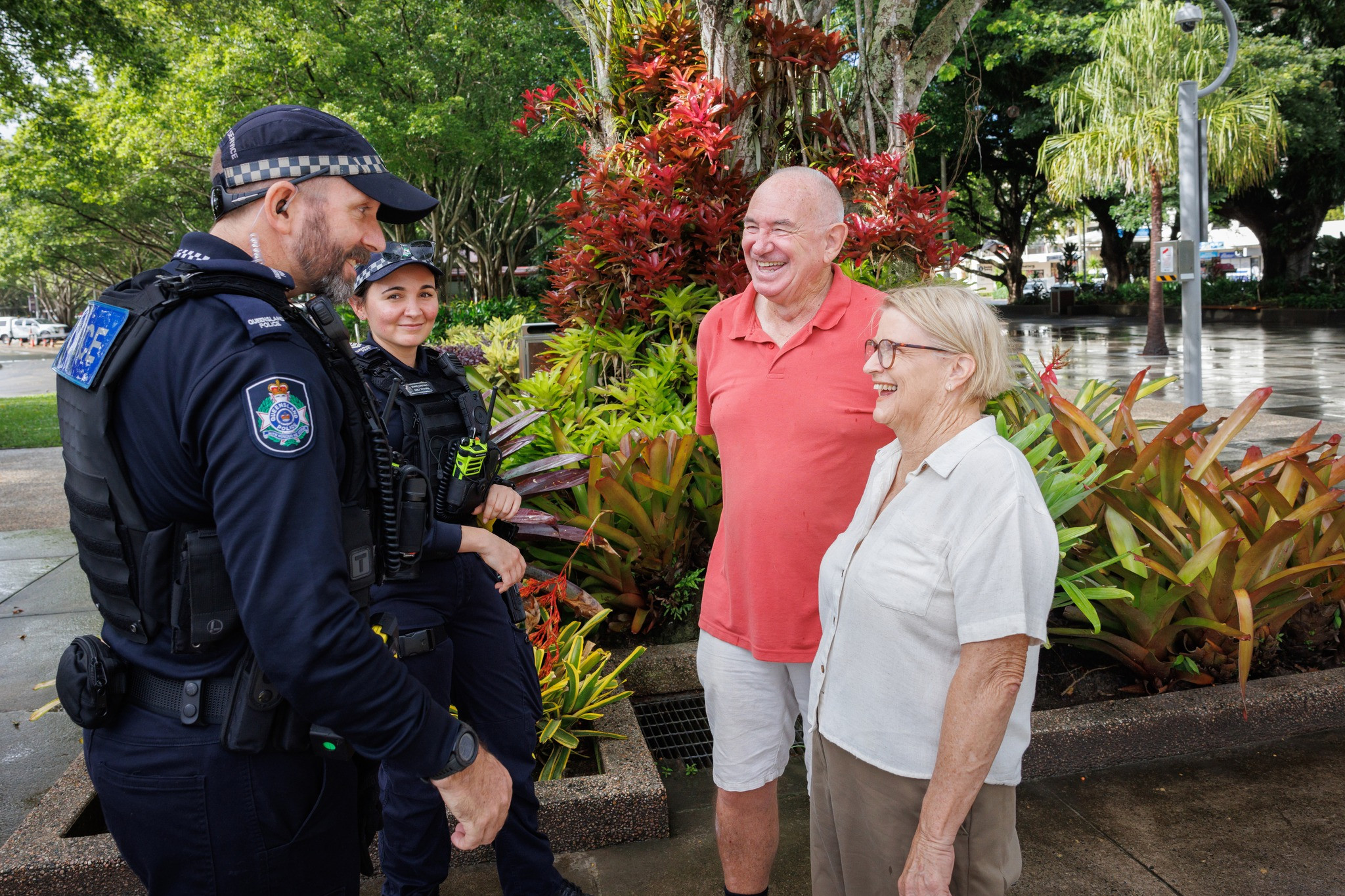 Police officers reassure elderly residents in the Cairns CBD. Picture: Police Cairns