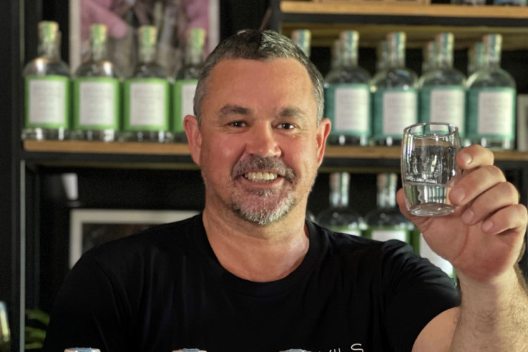 Devils Thumb head distiller Mark Norman raises a glass of the winner Navy Strength Gin