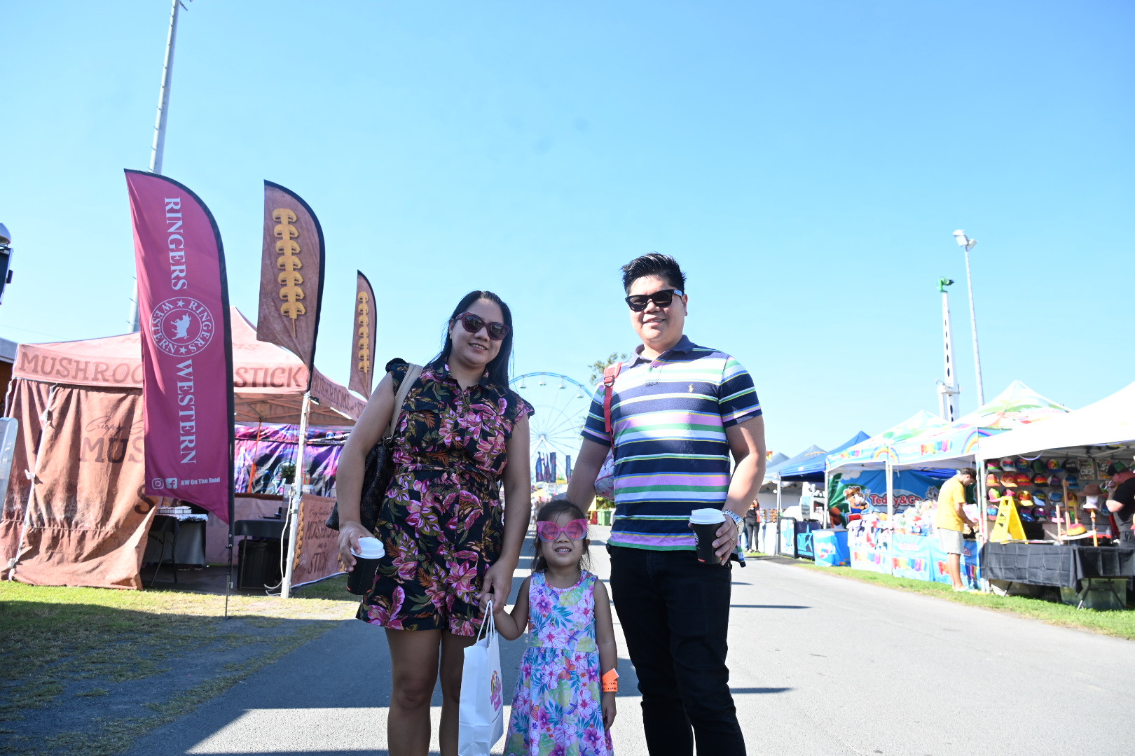 Kimberly and Karl Erana from Bentley Park with young Scarlett who’s enjoying the show for the first time.