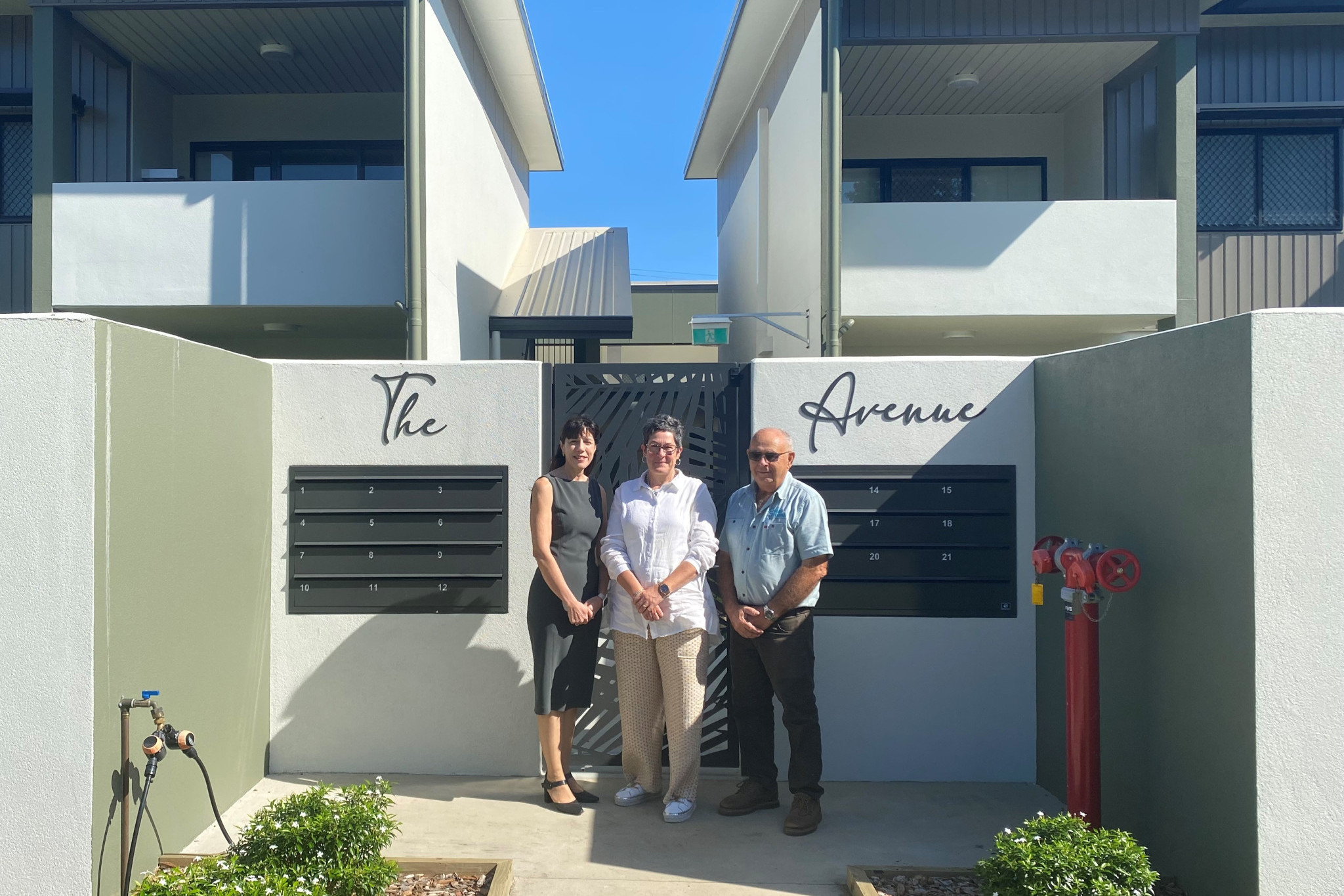 Mayor Teresa Milwood with Leanne and Allan Sultana who saved costs in infrastructure charges when constructing their apartment block - The Avenue. Picture: Cassowary Coast Regional Council