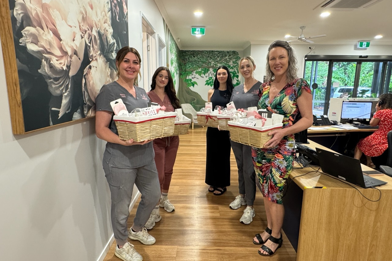 From left: Katy Hirst and The Aesthetic Lounge team, Mia Whitehouse, Ashley Casa, Lara Maskell with COUCH Cancer Hub NQ Executive Officer Emily Rossi during the Christmas hamper delivery at the COUCH Wellness Centre. Picture supplied.