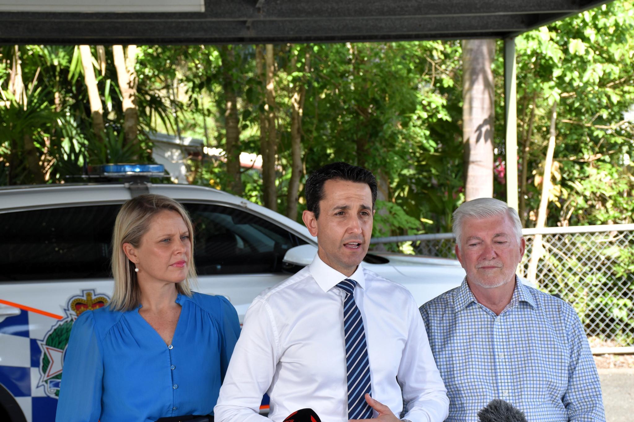 Queensland Premier David Crisafulli (centre) with Barron River MP Bree James (left) and Mulgrave MP Terry James (right) at the Far North Queensland police surge update. Picture: Hugh Bohane