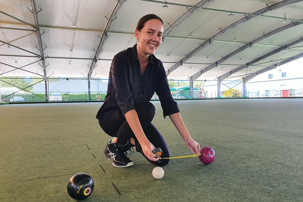 Mossman Bowls Club team member Emma Vizard getting the measure of this year’s corporate bowls competitors