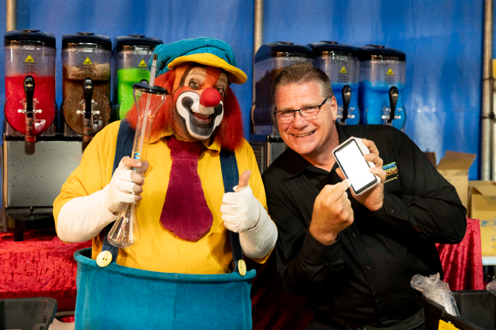 Troy Smith, now leading the charge at Hudson’s Circus (right), showing how far a passion for the circus can take you with Goldie the clown. Picture: Amanda Wright