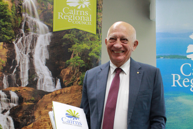 Mayor Bob Manning with the 2023-24 Cairns Regional Council papers. Picture: Isabella Guzman Gonzelez9