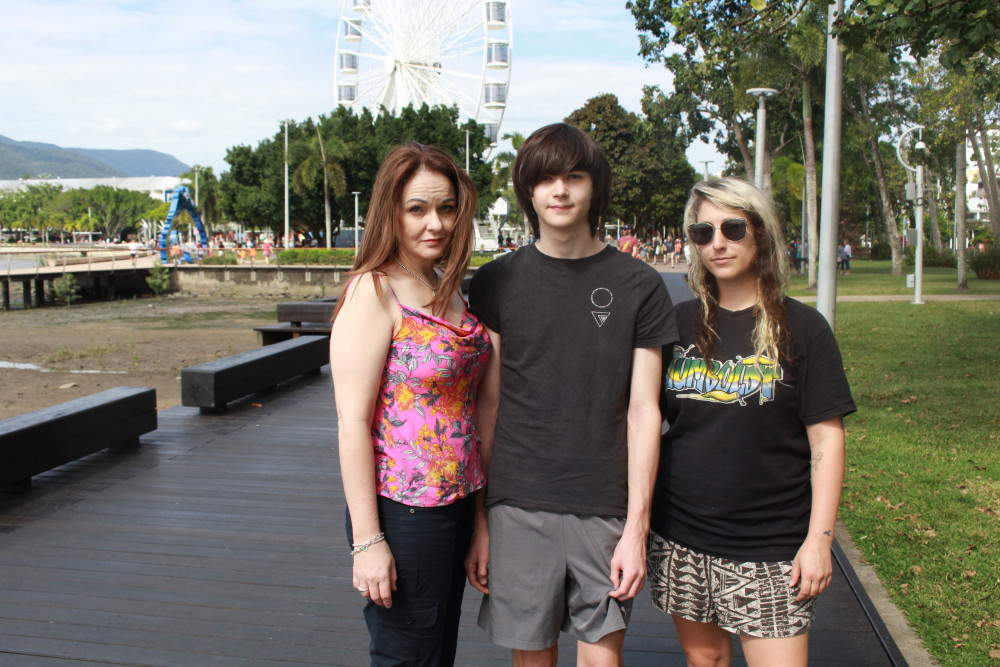 Emma Newman (left), her son Cody Newman and support worker Erica Siepker at the site of the alleged stabbing on the Cairns Esplanade.- Picture: Isabella Guzman Gonzalez