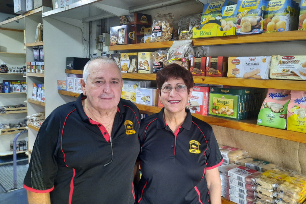 Len and Anita OIiveri in their popular Innisfail deli which they have operated for 40 years. Inset: The exterior of the shop.