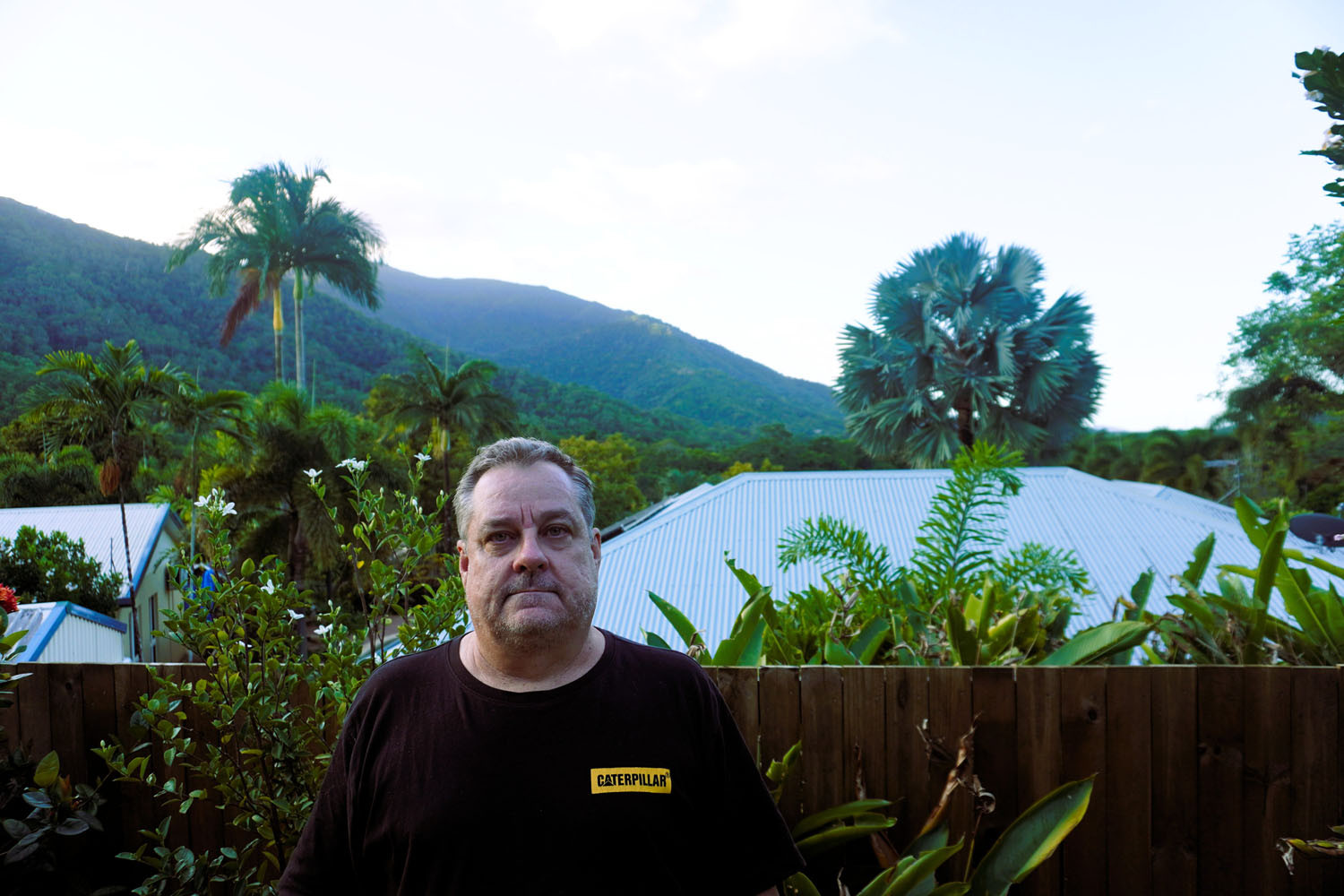 Redlynch resident Kim Prince with Boral’s Redlynch quarry in the background. Picture: Hugh Bohane
