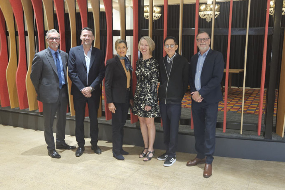 The senior executive team at The Reef Hotel Casino (from left) includes hotel general manager Wayne Reynolds, trust chief executive officer Brad Sheahon, chairwoman Wendy Morris, company secretary Alison Galligan, executive director Allan Tan and hotel casino chief executive officer Paul McHenry. Picture: Nick Dalton