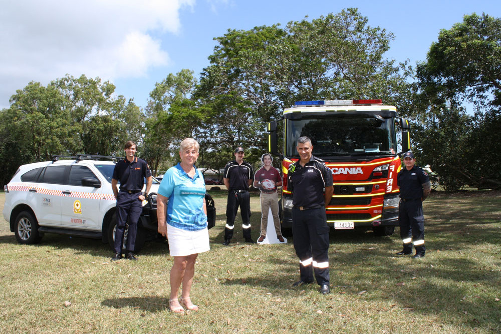 Preparing for Get Ready Emergency Services Day are Cairns regional councillor Rhonda Coghlan with (from left) SES Holloways Beach group leader Blair Bloustien, and firefighters Nathan Coates, Danny Stowers and Liam Soblusky.