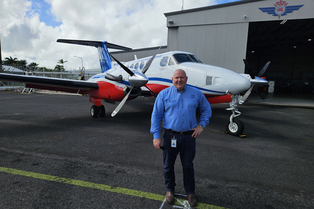 Royal Flying Doctor Service Cairns base manager Justin Reeves outside the hangar and headquarters which were inundated by flood waters in December last year. Picture: Nick Dalton