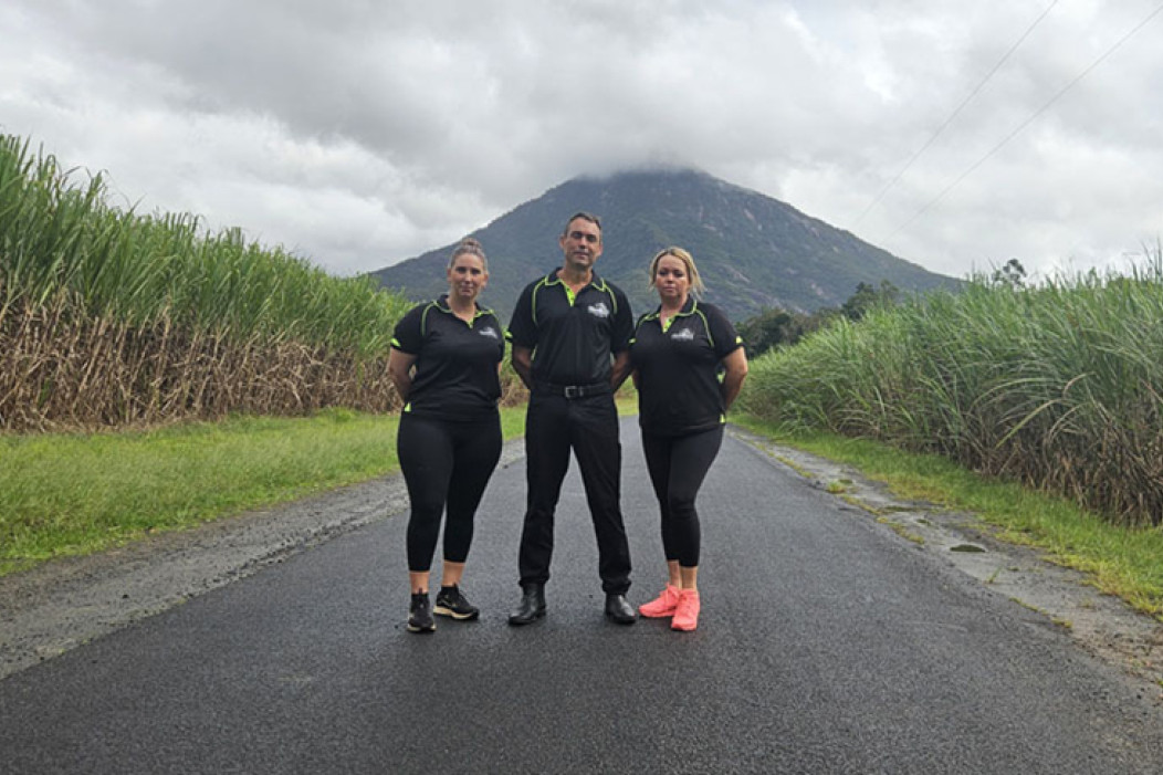 The Great Pyramid Race organisers Rebecca Jones (left), vice-president Graham Camp and president Renee Edwards, with the iconic peak in the background Picture: Nick Dalton