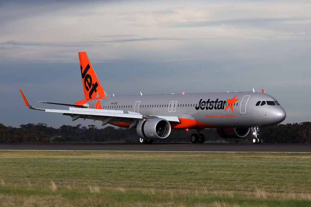 Jetstar has started using a 232-seat A321 Neo as demand for Bali flights grows, while (inset) AirAsia Indonesia is happy with its passenger numbers too.