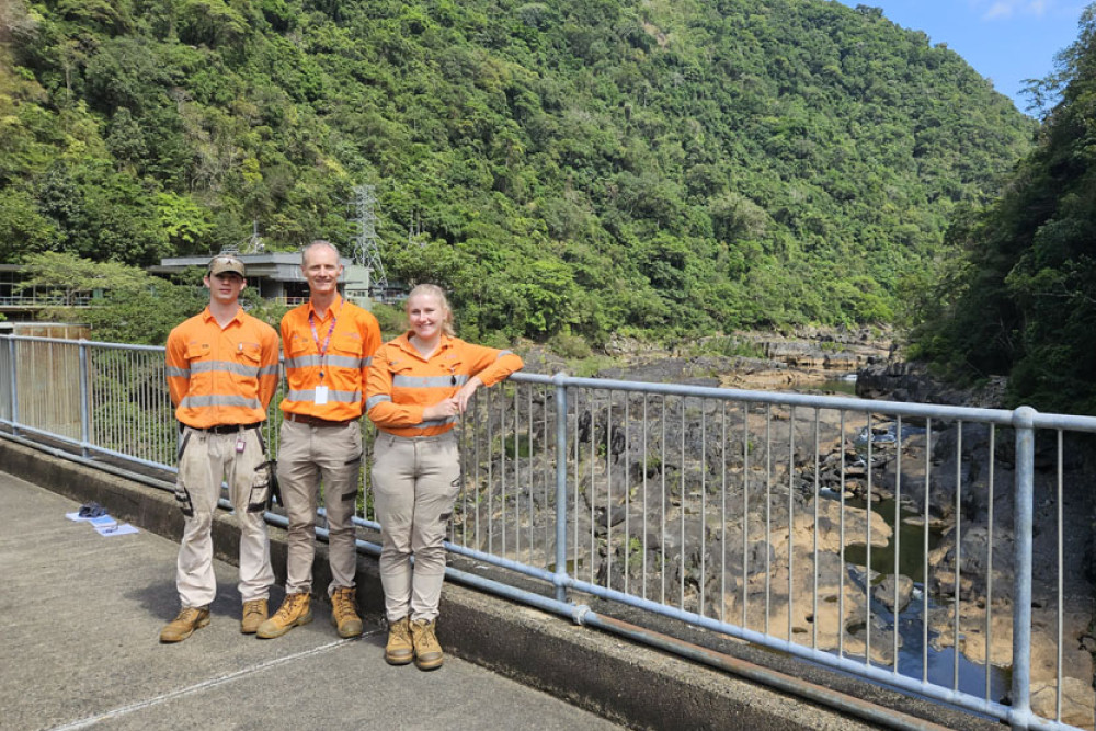 Barron Gorge hydro apprentices Liam Prestipino, 18, (left) and Aelira Catalina, 18, with Cleanco boss Tom Metcalfe. Picture: Nick Dalton