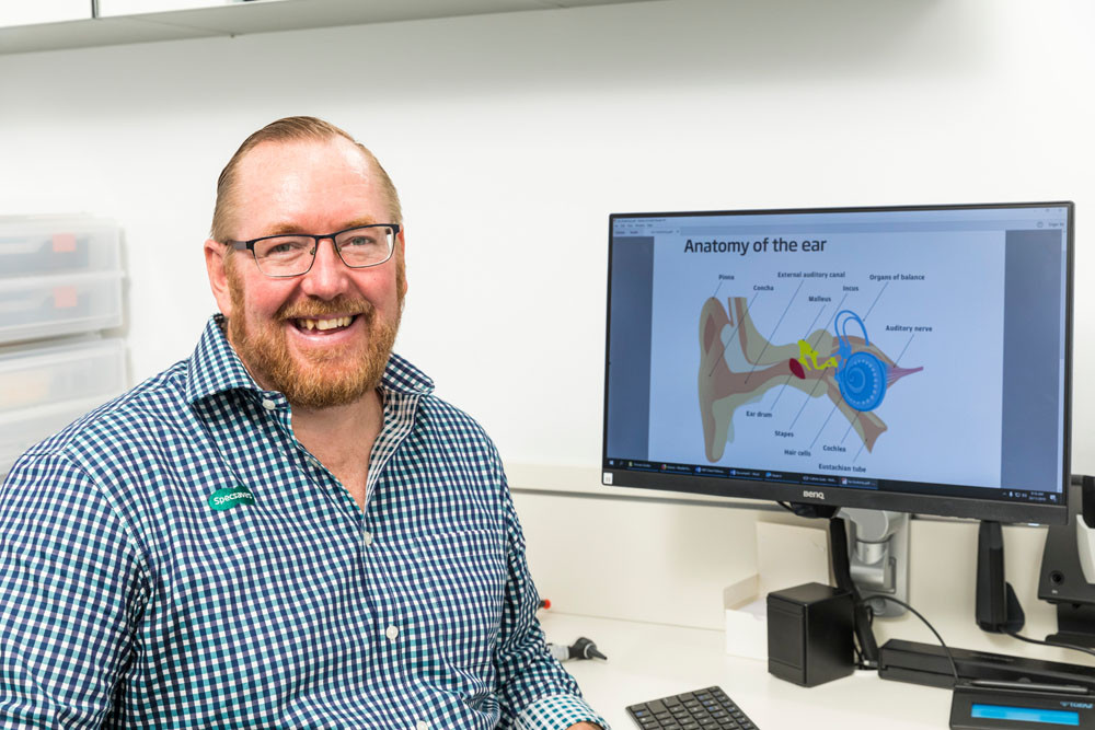 Specsavers Cairns Central Shopping Centre audiology professional Angus McKenzie is worried people are cutting back on health checks.