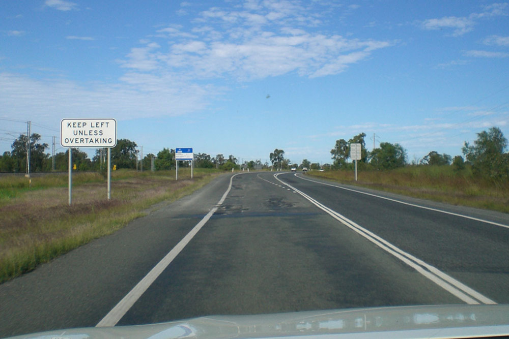 A badly potholed stretch of road on the Bruce Highway