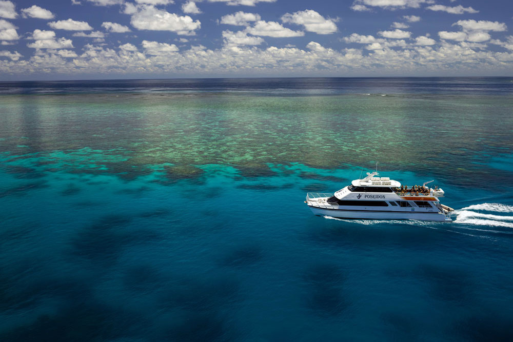 Quicksilver’s Poseidon heads out to Agincourt reefs.