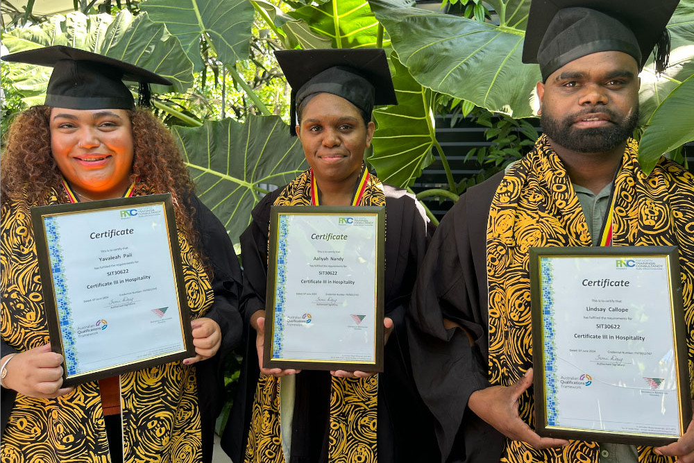 NITA’s newest graduates Yavaleah Paii, Aaliyah Nandy and Lindsay Callope have already secured work placements with their newly-acquired certificate III in hospitality. Picture: Supplied