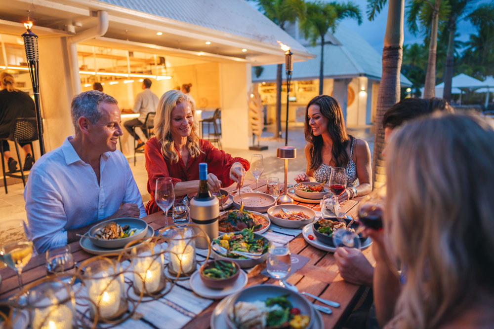Guests enjoy food, drink and atmosphere at the Sheraton Grand Mirage Resort at Port Douglas. Picture: Sheraton Grand Mirage Resort