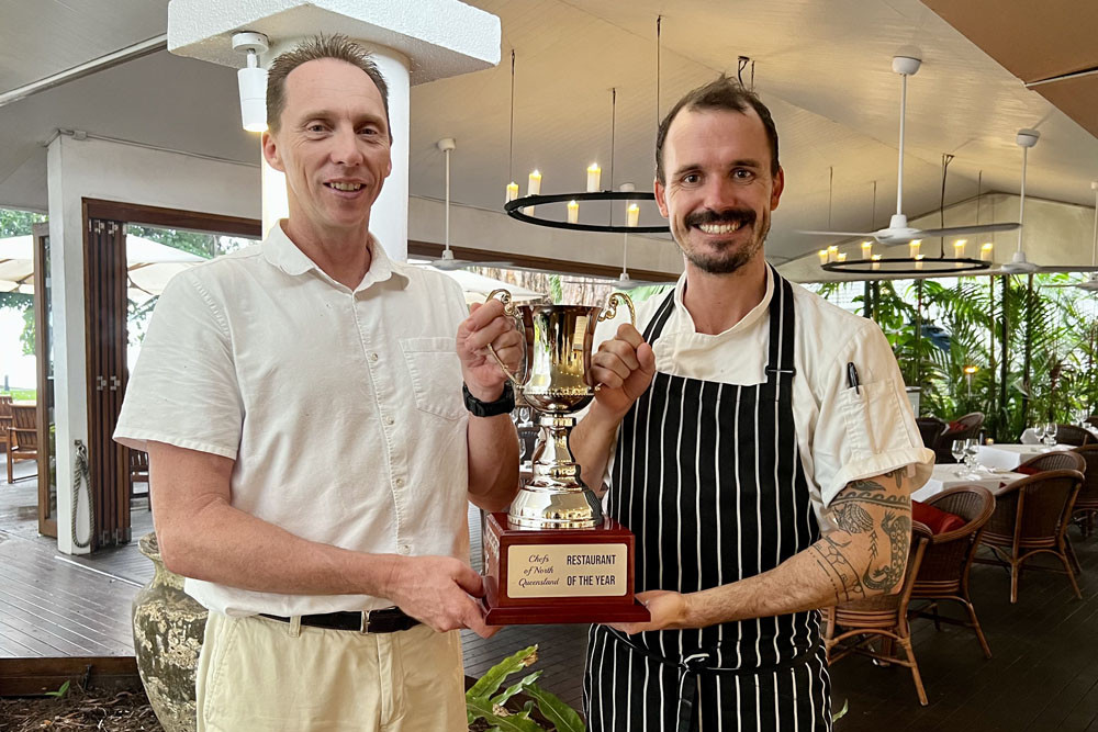 The Reef House Adults Retreat general manager Wayne Harris and head chef Ondrej Urbanovsky celebrate winning the Chefs of North Queensland Restaurant of the Year for the fourth time in five years. Picture: The Reef House