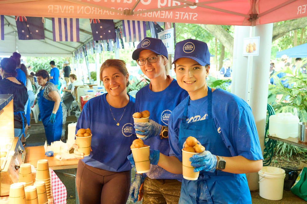 Volunteers frying honey puffs. The honey puff eating competition is one of the highlights of the Greek Festival. Picture: Supplied