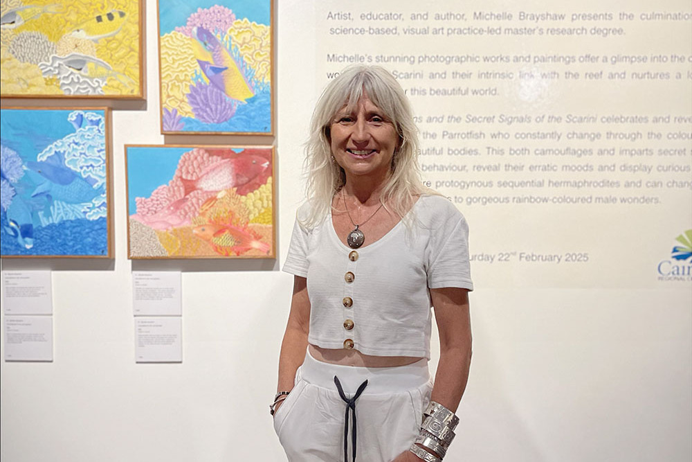 Visual artist Michelle Brayshaw with her exhibition on parrotfish at the Tanks Arts Centre. Picture: Supplied