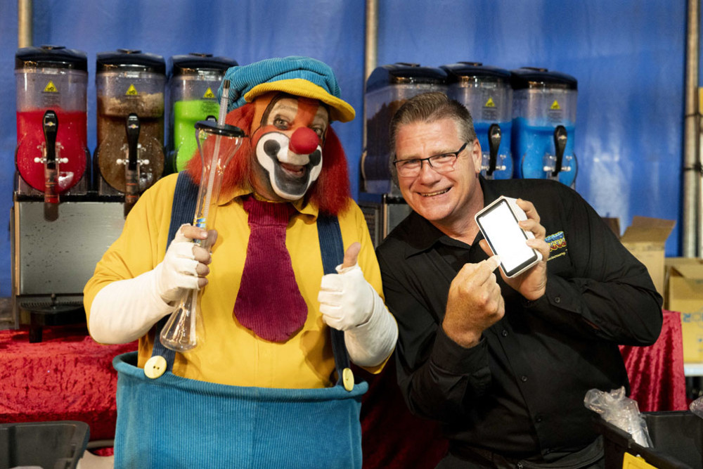 Troy Smith, now leading the charge at Hudson’s Circus (right), showing how far a passion for the circus can take you with Goldie the clown. Picture: Amanda Wright
