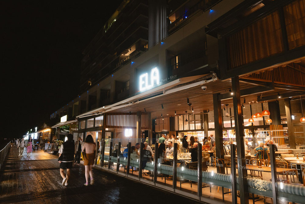 The new Ela Drink + Meze lights up the Cairns waterfront. Inset: Owner Joan Wilson. Pictures: Supplied