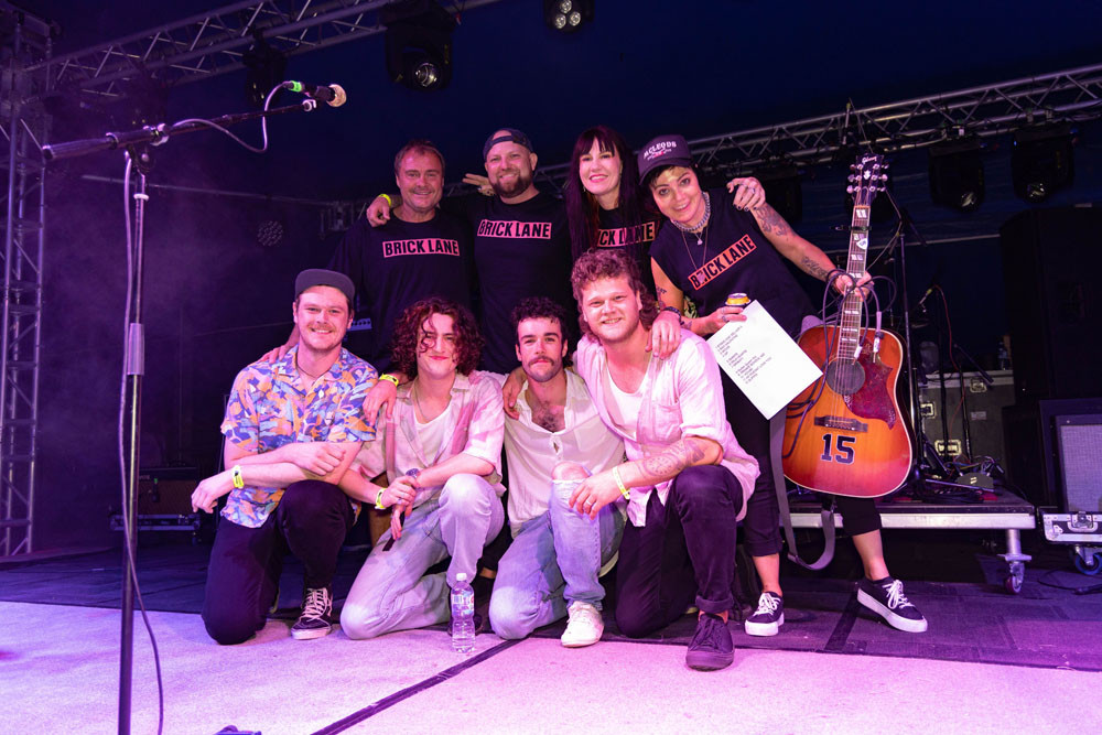 Last year’s Passport to Airlie winners Benny Nelson, Ryan Brook, Sebastian (Baz) Jennings-Hingston and Harrison Charles Shakespeare-Davies with their backstage crew and performing (below).