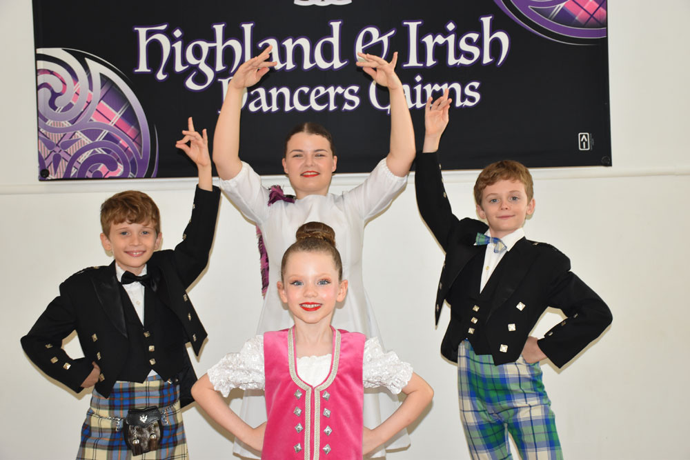 City of Cairns Highland and Irish Dancers members (from left) Aaron Gaustad, Grace Blakeney, Cate Blakeney (in front), and Johnathan Gaustad are excited to compete at the 2024 Queensland highland dancing championships at Smithfield. Picture: Isabella Guzman Gonzalez